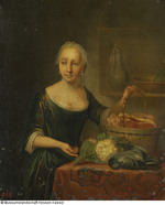 Frau mit Küchenbedarf