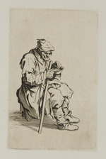 Sitzender Bettler beim Essen